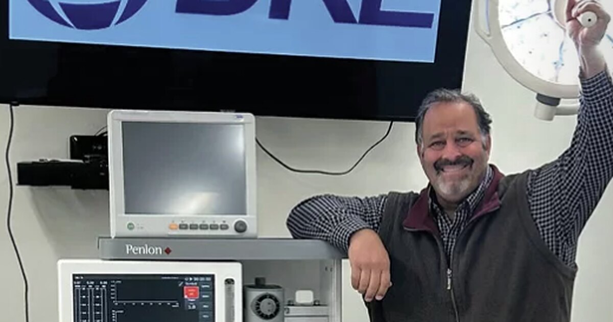Dave Ganim of Ganim / DRE Medical beside a Penlon Prima 460 anesthesia machine